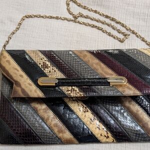 Supreme Diagonal Striped Snakeskin Clutch in Black, Brown, Gray, Gold, Burgundy